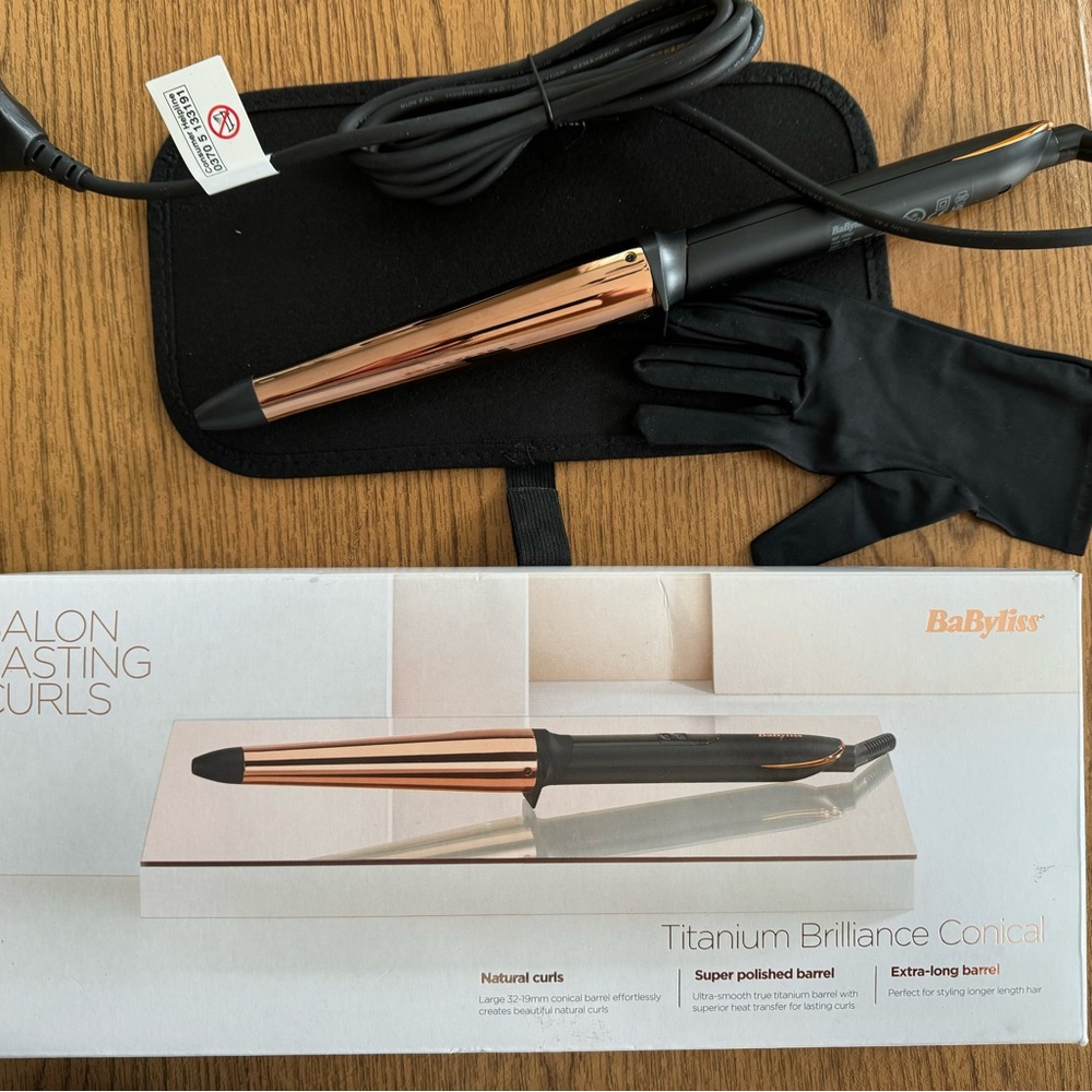 Electric European BaByliss Rose Gold Curling Wand bought in London never used.